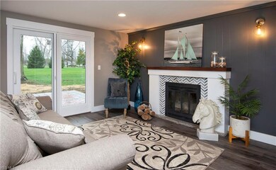 Light filled rooms are warmed by a wood burning fi