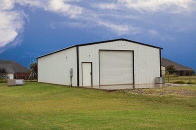 30X60 shop with electricity. Storm shelter next to