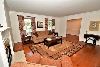 The Living Room With Wood Floors, Gas Fireplace & 