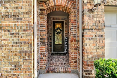The quaint, brick-lined Porch keeps the elements off the pristine solid wood front door as well as your guests.