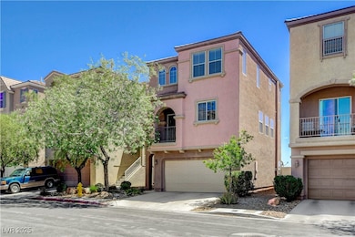 View of front facade featuring an attached garage,