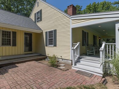 The brick courtyard provides access...