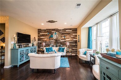 Glamorous living room with beautiful hardwood floo