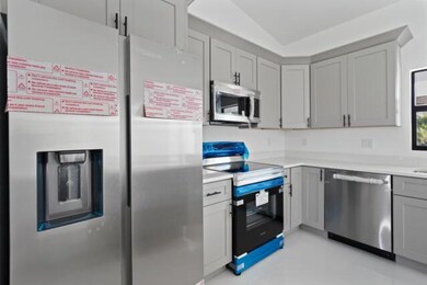 2458 NW 9th Terrace, Cape Coral, FL 33993 - photo 7