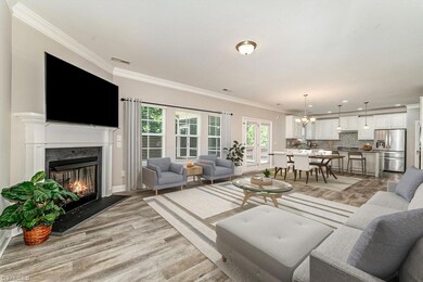 Virtually stage Family Room view into kitchen
