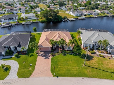 Aerial perspective of suburban area with a nearby body of water
