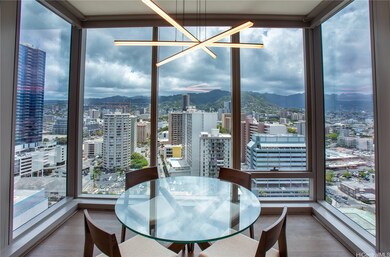 Dining area with sunrise, mountain and city views. Furniture has been removed