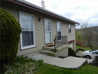 Exterior Front. ENTRANCE SHOWING NEWER WALKWAY AND STEPS