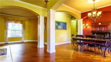 Separate Living and Dining Areas with Beautiful Ha