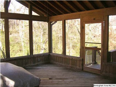 covered deck and hot tub