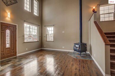 18' ceilings and a wall of windows