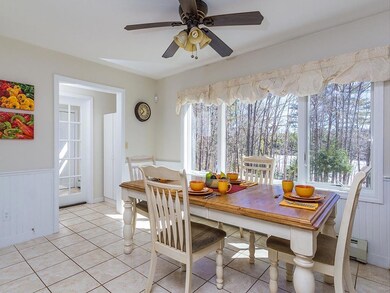 Dining area overlooks the pond.