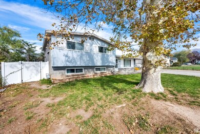 Tri-level home featuring a gate