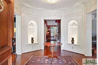 FOYER: Octagonal Foyer with exquisite carved moldi
