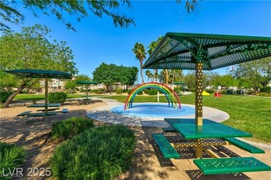 View of property's community featuring a yard