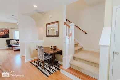 Interior space featuring visible vents, baseboards