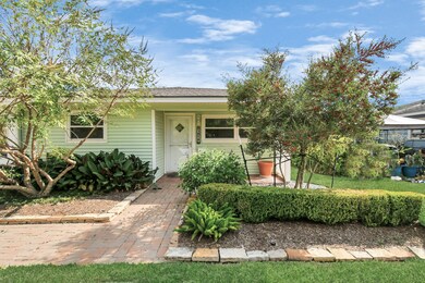 We love the charming brick walkway leading to the