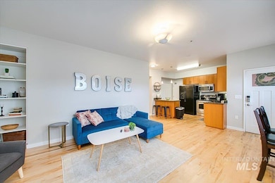 Living area featuring light wood-style floors