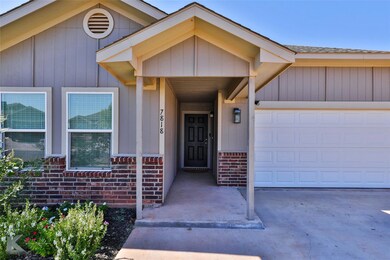 Property entrance with a garage