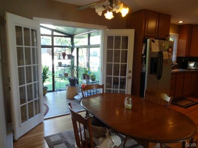 Newer French Doors lead to Heated Florida Room