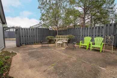 View of patio with a fenced backyard