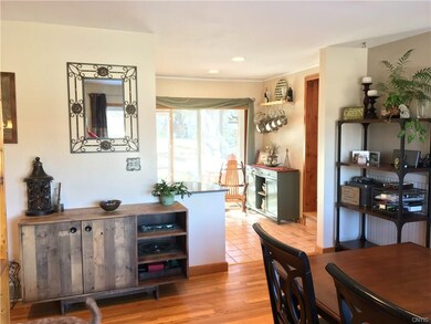Look from the Dining room, into the kitchen, slide