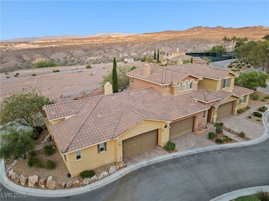 Aerial view of property and surrounding area with
