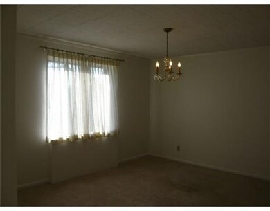 Exterior Front. Formal dining room with window int