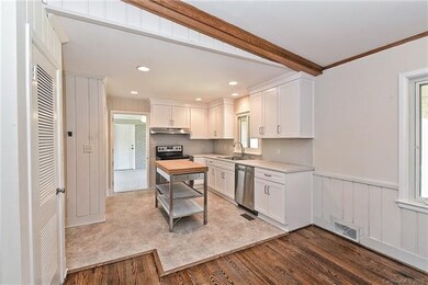 Kitchen is spacious and well thought out.