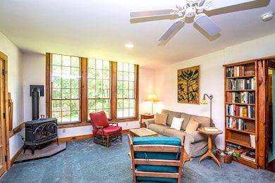 Living Room with Gas Stove and Built-In Shelves