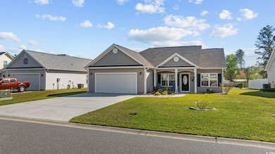 View of front of property with an attached garage,