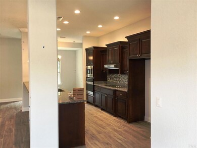 Columns set off this kitchen & define the space.