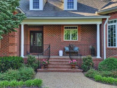 Welcoming Brick and Aggregate Front Porch