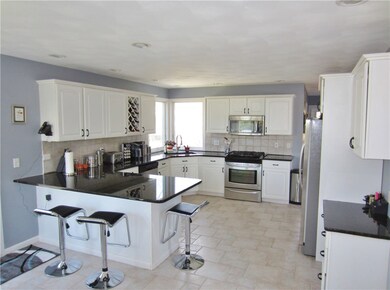 Bright and Spacious Eat in Kitchen Boasts a Breakf