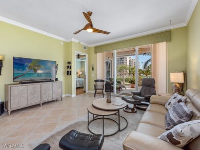 Living area with visible vents, baseboards, orname