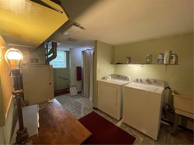 Laundry room also has a full bath