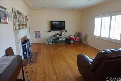 Formal hardwood floor living room with fireplace