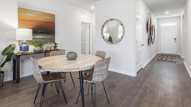 Dining room featuring dark hardwood / wood-style f
