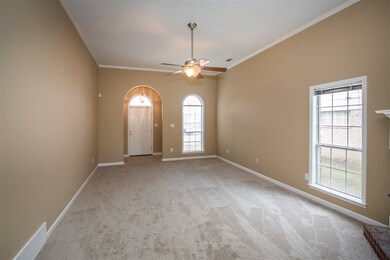 The gracious entry leads to the spacious, warm and