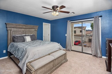 Primary Bedroom with Balcony