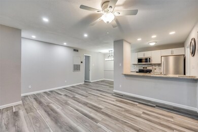 Unfurnished living room featuring light wood-type 