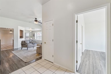 View from entry into main room and kitchen