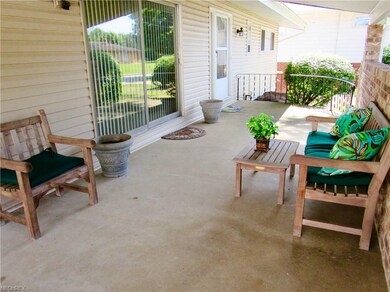 The quiet front porch is a great sitting area.