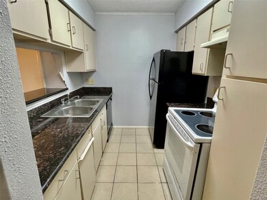 Kitchen with Breakfast Bar features Granite Counte