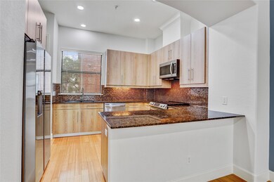 This stylish and functional kitchen offers ample s
