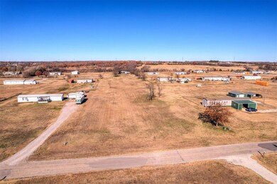 Birds eye view of property with a rural view