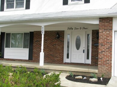 Honeytree full front porch with swing