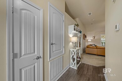 Corridor featuring dark hardwood / wood-style floors