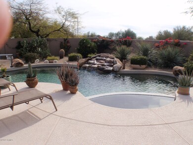 Pool Has Tranquil Waterfall
