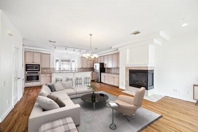 Generously sized living area ideal for both relaxing and entertaining, with excellent natural light throughout.


